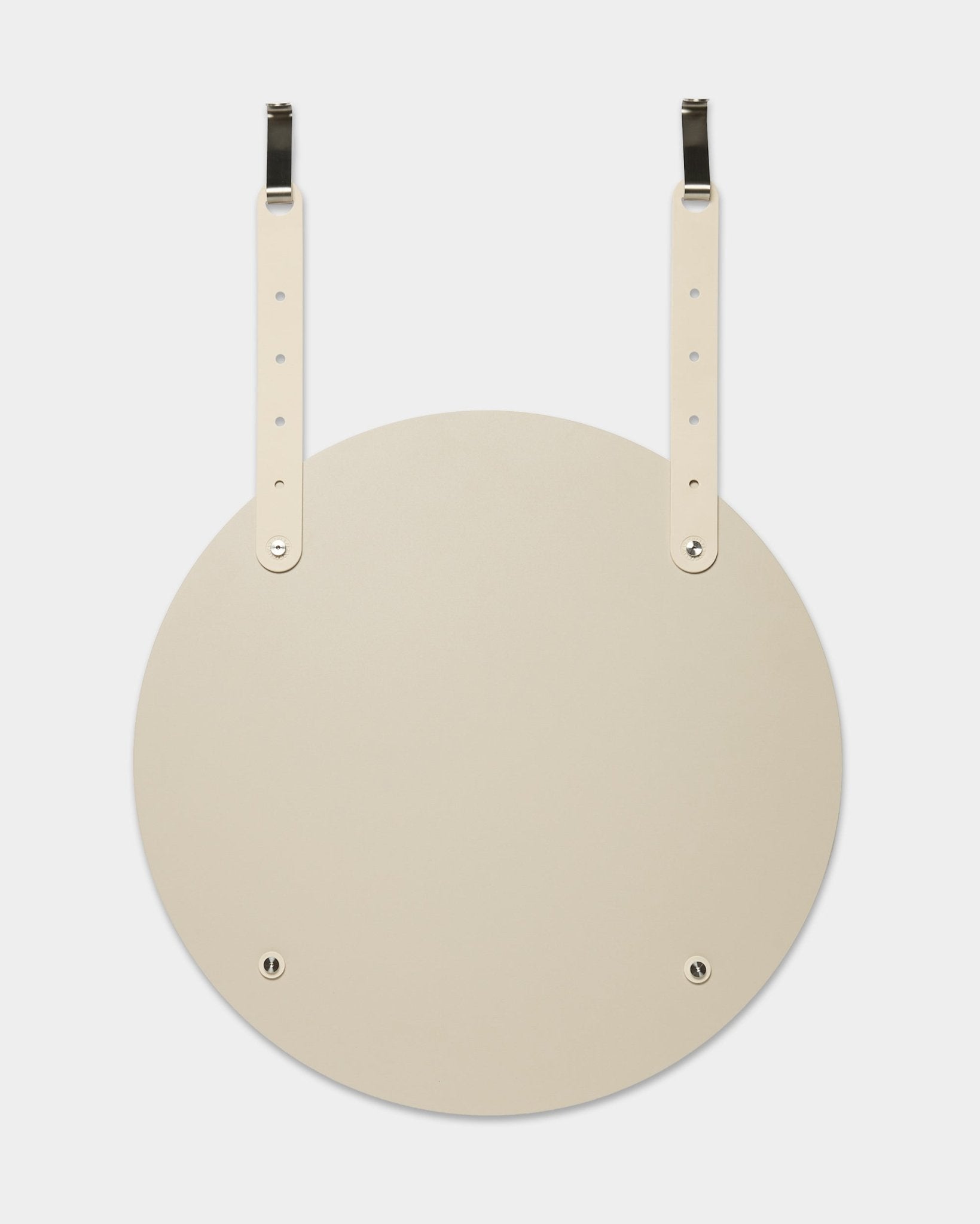 De Vala | Spiegel / BM1 van WoodUpp is een ronde beige wandspiegel met verstelbare leren riemen om op te hangen; voor de installatie hoef je niet in de muur te boren.